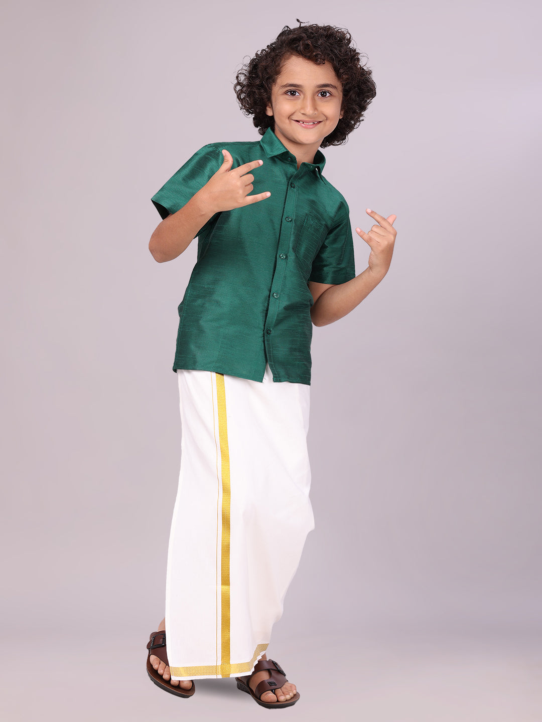 Boys Green Color Half Sleeves Shirt with Gold Jari Flexi Dhoti side pose